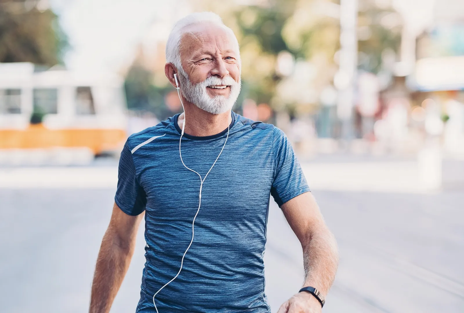 Physically-fit senior exercising in his local town.