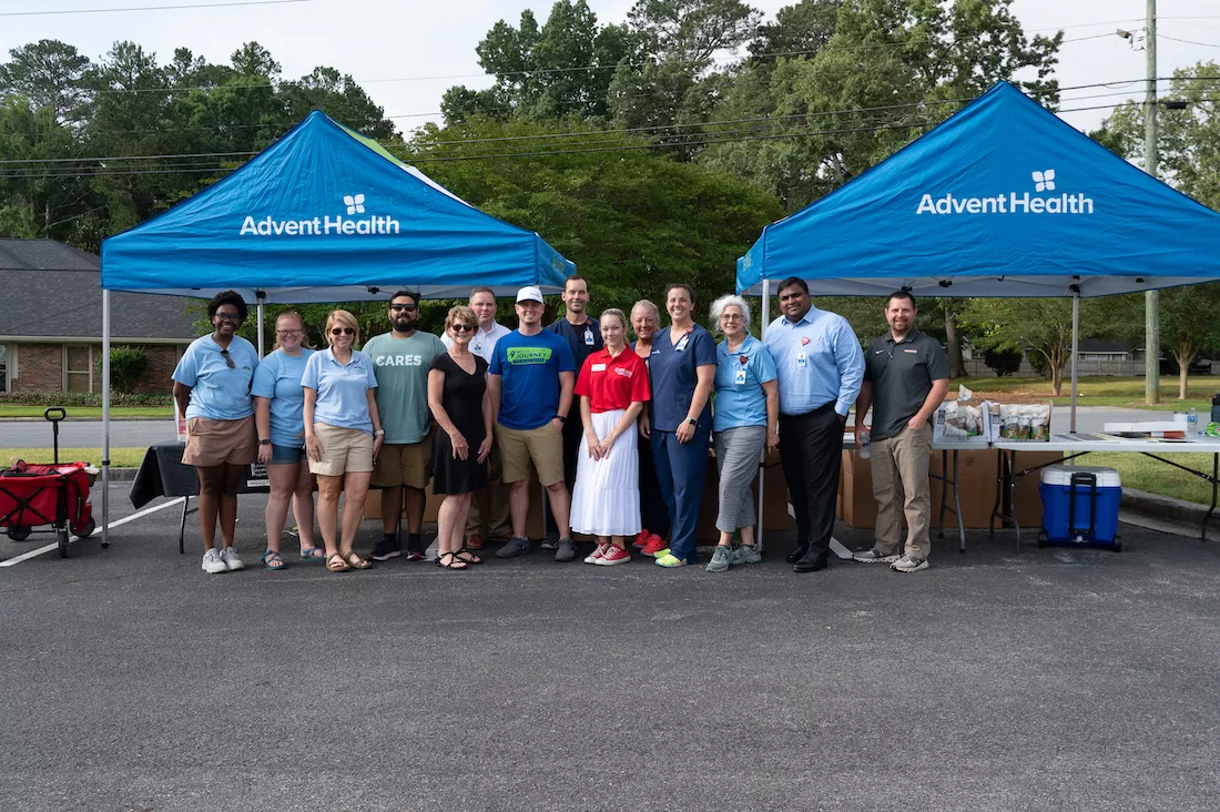 Community organization representatives included (left to right): Kaneisha Smith, Lauren Shamblin and Erin Hernandez from the Northwest Georgia Cancer Coalition, Pedro Avila and Carla Harward from Helping Hands Ending Hunger Inc., Brandon Lindley, Tanner Hayes and Riley Benter from AdventHealth Redmond, Natalie Peterson from UGA Extension Office, Cynthia Kinne, Emily Rakestraw, Edma Diller, Paul Samuel, and Chad White from AdventHealth Redmond.