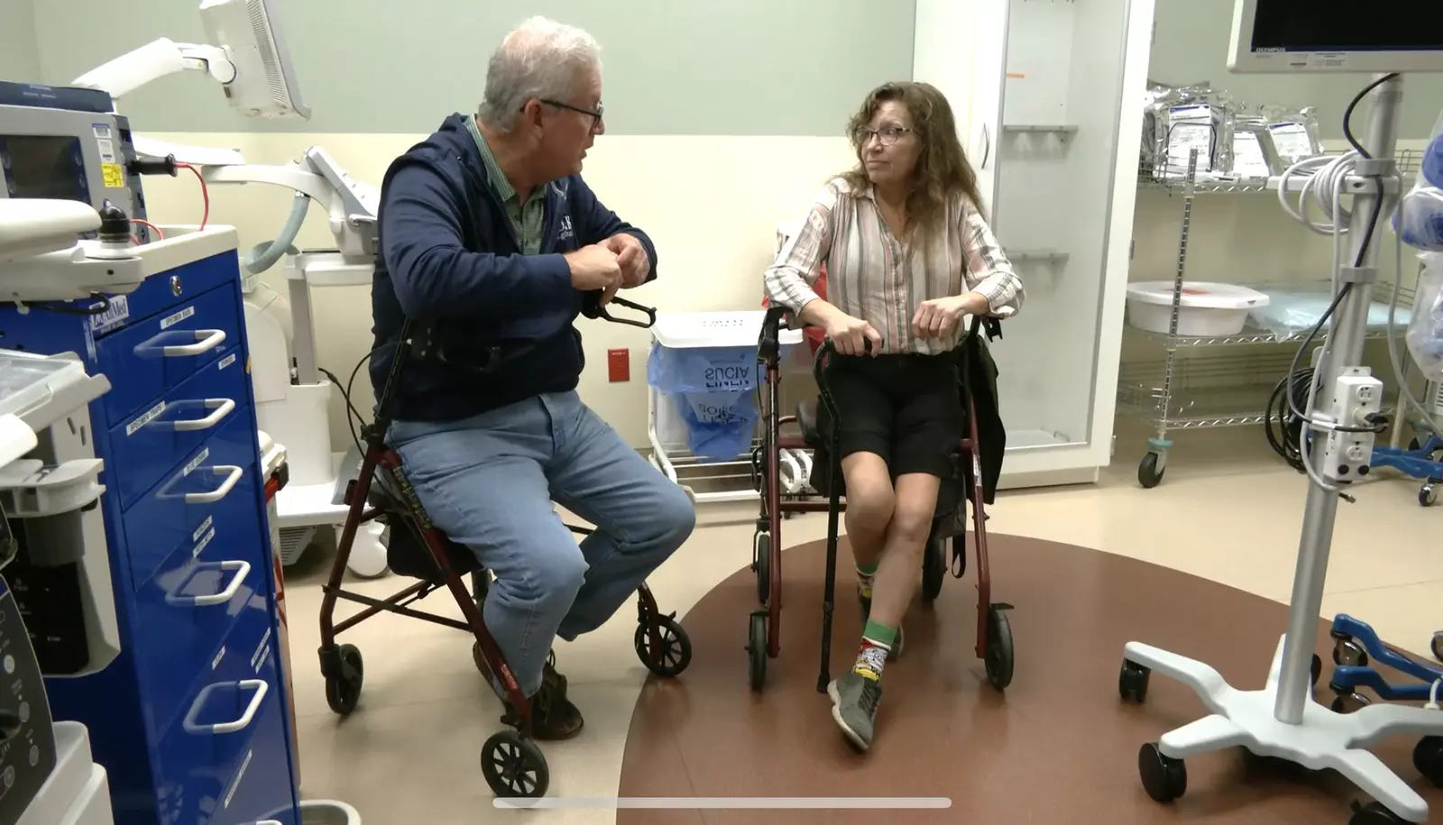 Chris Robinson and Lori Roth prepare to meet with their surgeons a few weeks before surgery.