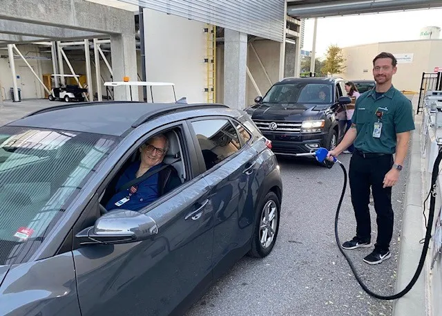 Team members receive fuel at AdventHealth Tampa following Hurricane Milton.