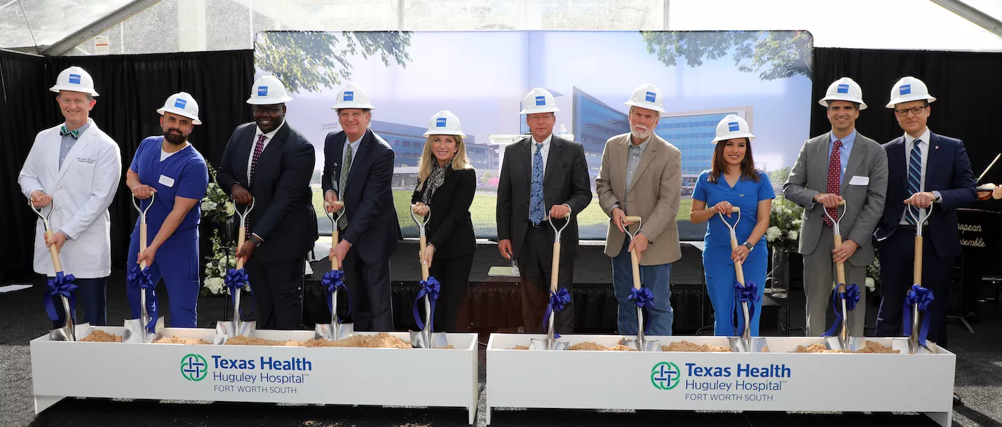 Community leaders, elected officials, staff and executives gather to break ground on new patient care tower.