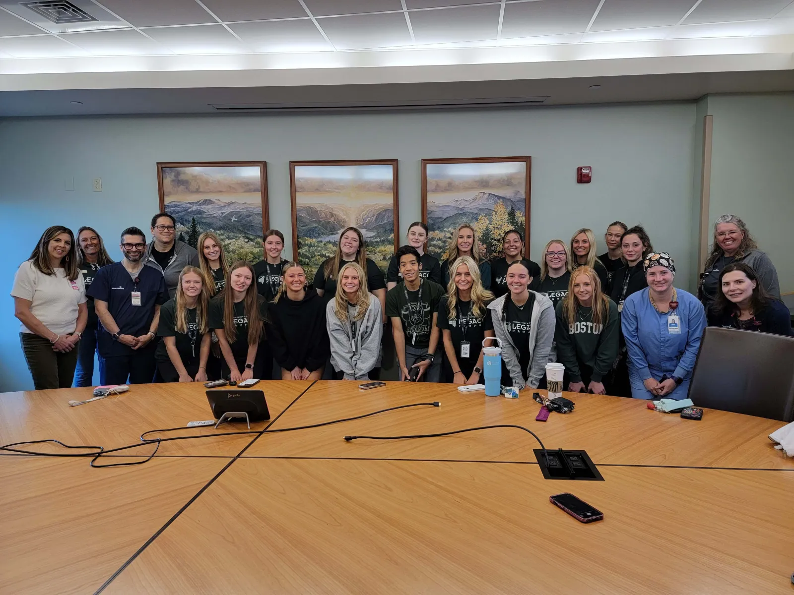 Group of students smiling with nurses