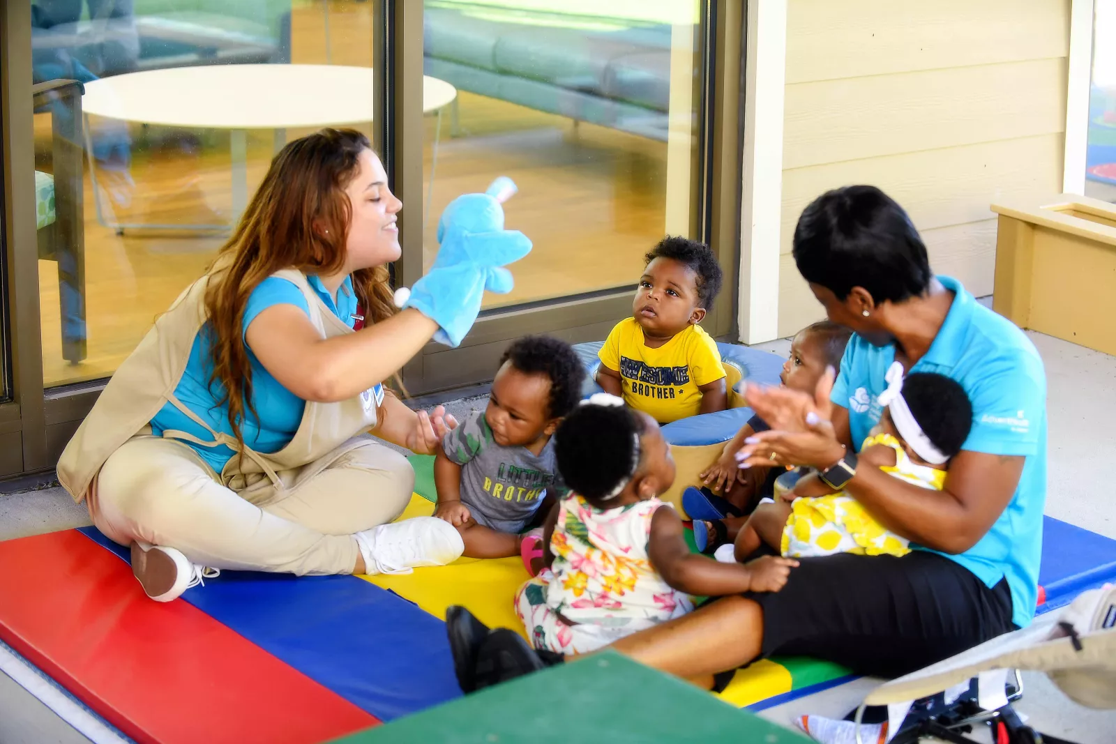 Teacher with infants.