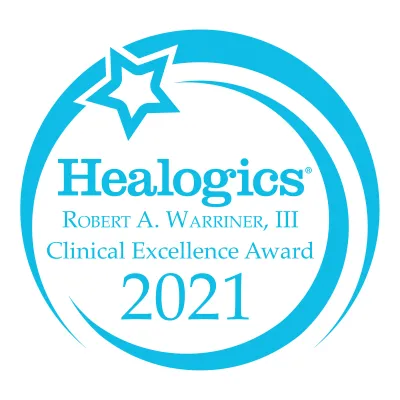 Healogics® 2021 Clinical Excellence in Wound Care Award logo.